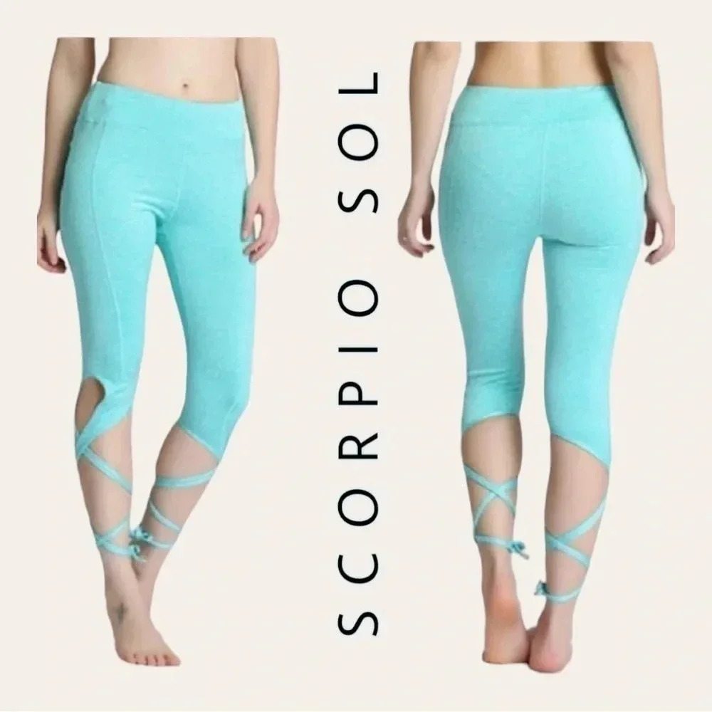 0362. SCORPIO SOL AQUA ATHLETIC CAPRIS WITH WRAP AROUND LEGS SIZE XSMALL